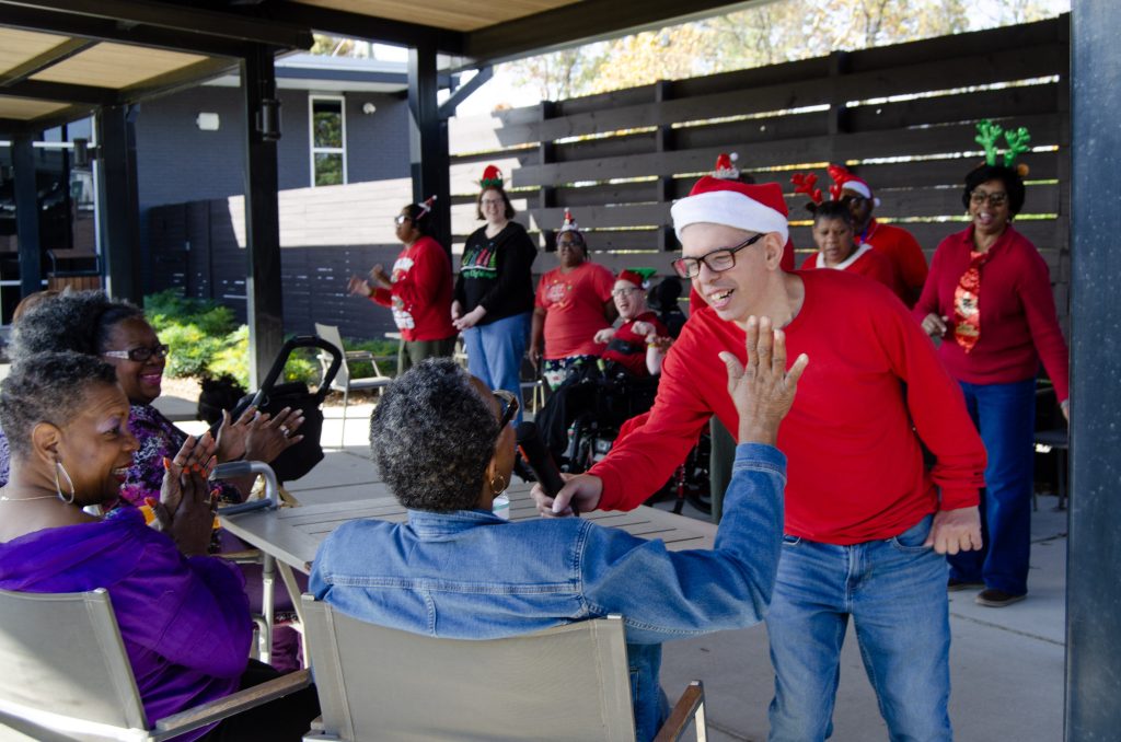 United Ability's choir singing for Alabama Cares support group.